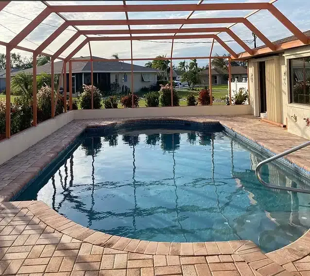 Fully restored pool cage with new screen and paint