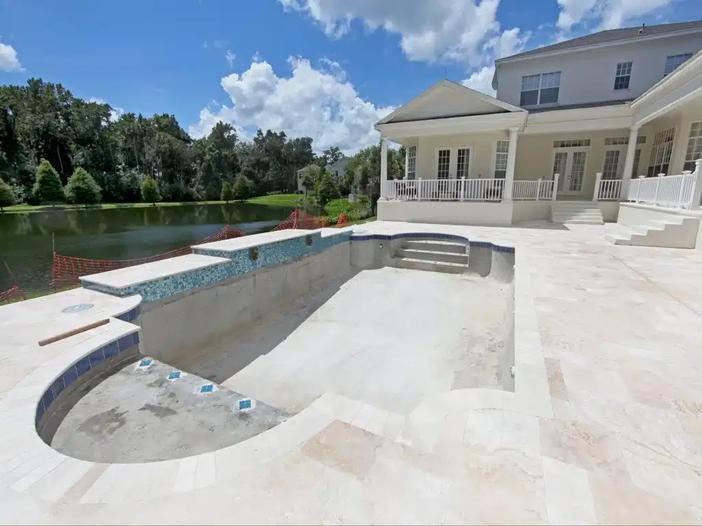 Pool deck being prepared for finishing