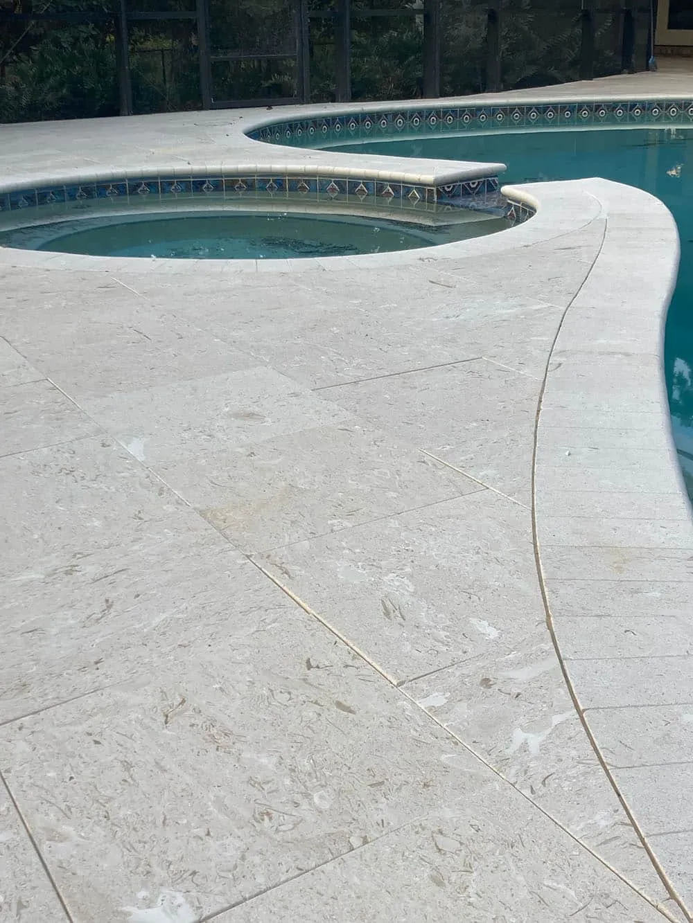 Pool deck with shellstone pavers at a Florida home