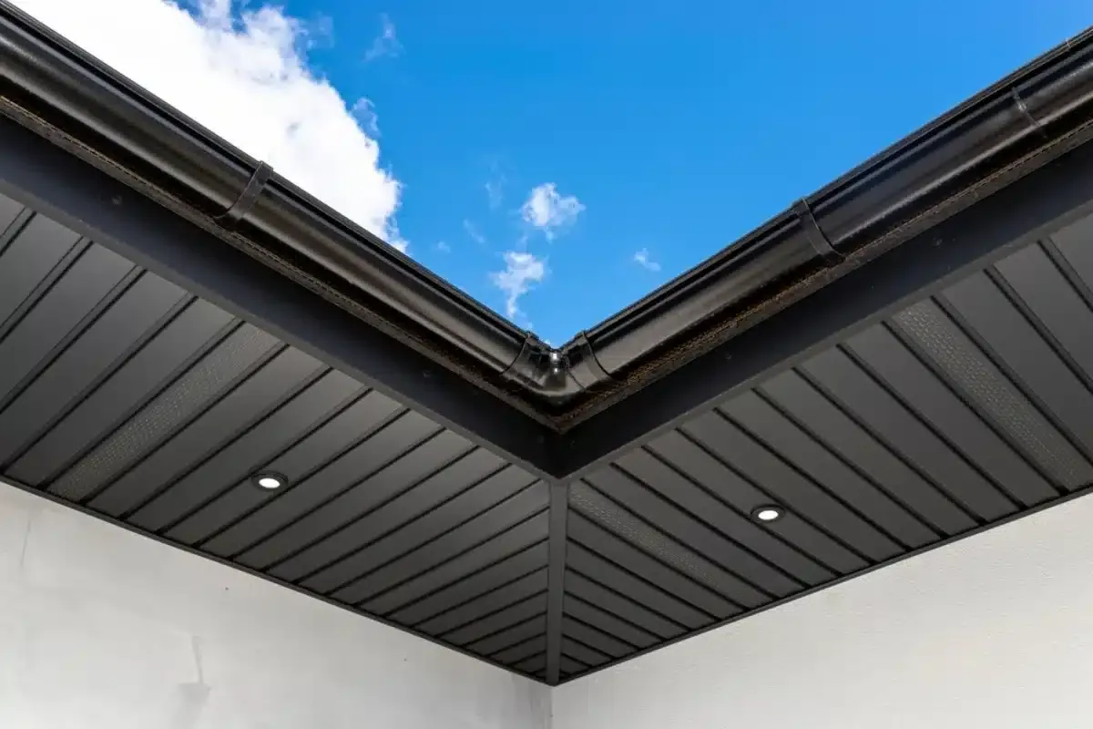 Black aluminum gutter with modern soffit and fascia installation on a residential home in Sarasota Florida