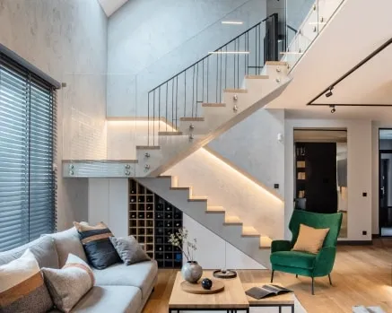 Open staircase with modern railing and interior finishes